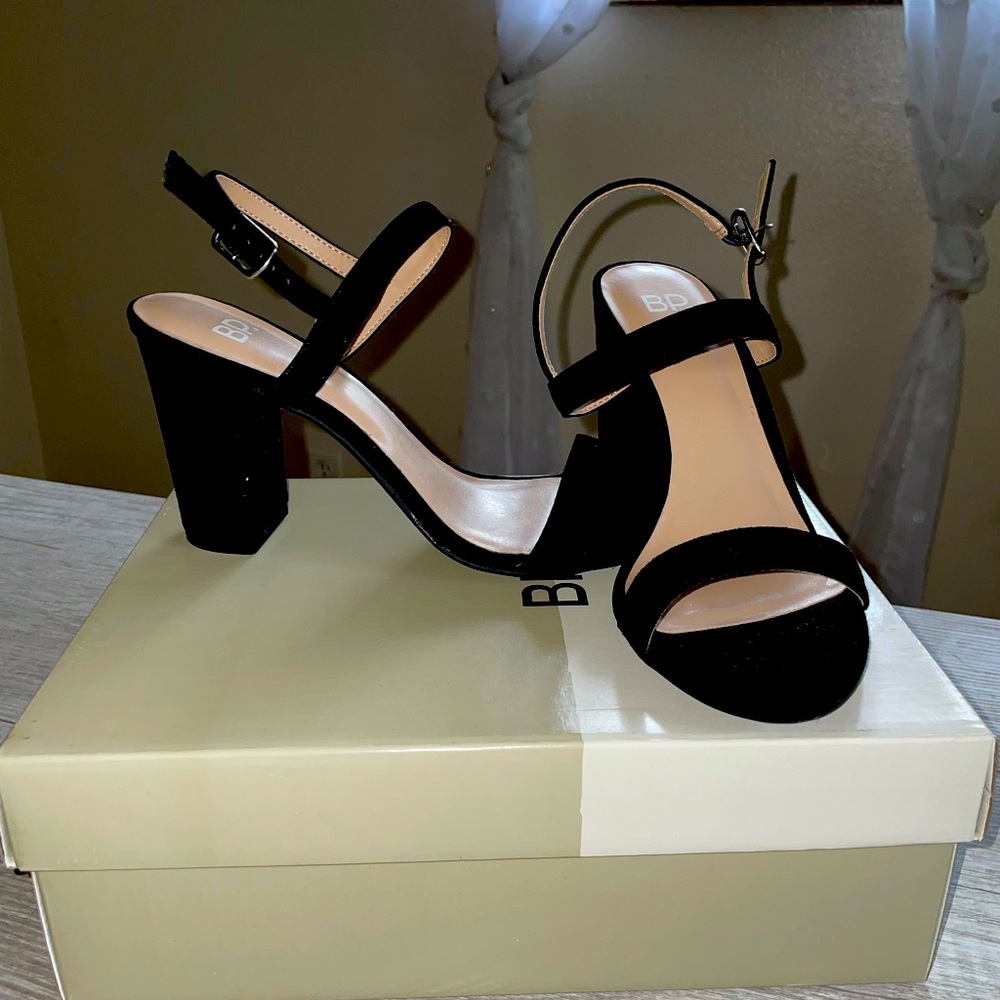 Brand new, never worn black heels.